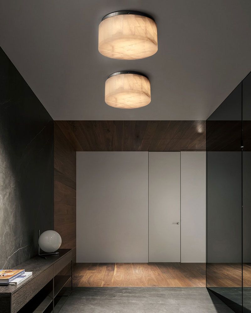 Round Alabaster flush mount ceiling light in brass frame for bedroom
