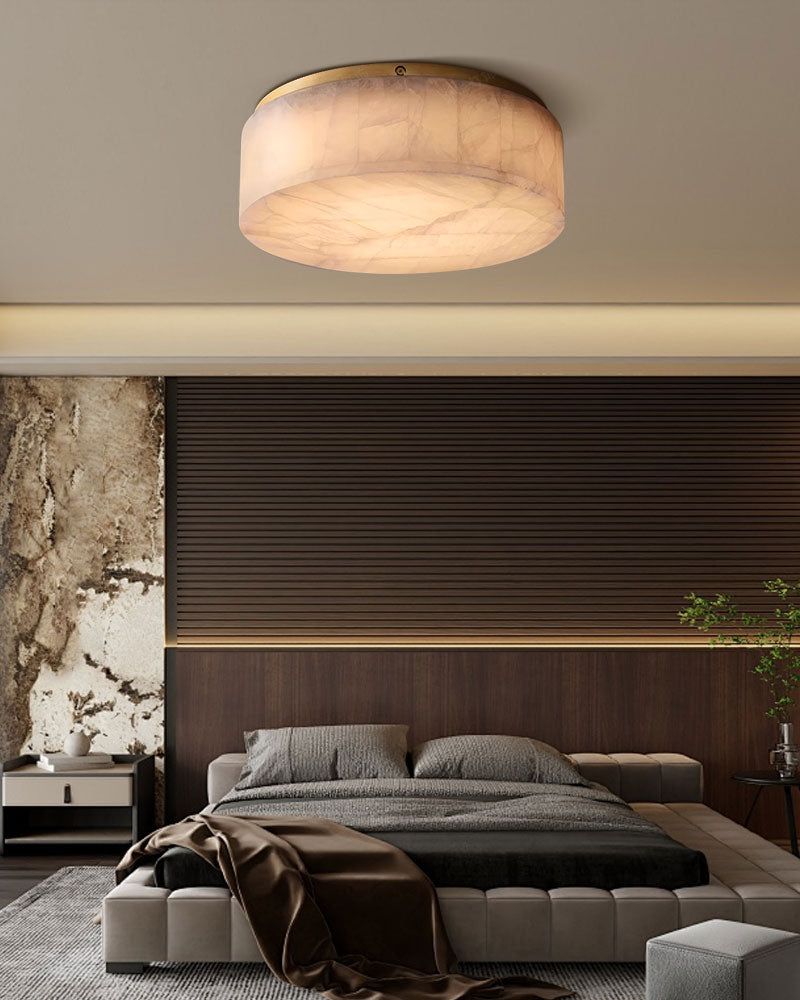 Round Alabaster flush mount ceiling light in brass frame for bedroom