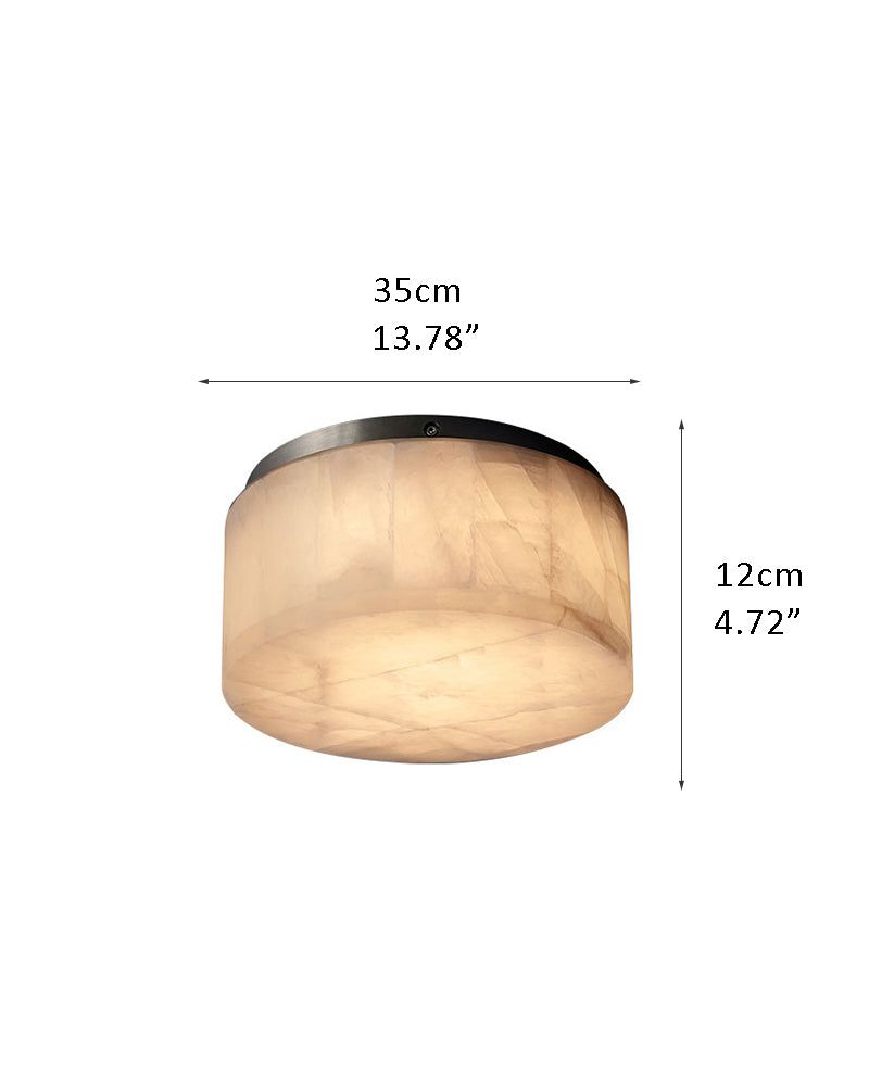 Round Alabaster flush mount ceiling light in brass frame for bedroom