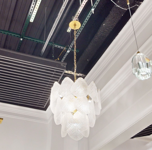 Antique Gold Frosted Glass Nine-Light Chandelier with Cascading Petal Design - Zonesus