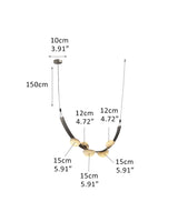 Leather pendant lamps with semicircular marble diffusers on a U-shaped strip metal base