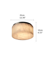 Round Alabaster flush mount ceiling light in brass frame for bedroom